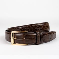 Our Chocolate Brown Genuine Crocodile Skin Belt Is A Must-Have In Any Wardrobe. Timeless And Versatile, This Belt Will Effortlessly Compliment Almost Any Outfit. Perfect For Day Or Night, This Is One Of Those Accessories That Will Carry You From Season To Season. Features: Genuine Crocodile Skin Hidden Snaps For Interchangeable Buckle Pebbled Calf Skin Lining Crocodile Belt, Tan Leather Belt, Brass Belt Buckles, Vintage Belt Buckles, Casual Belt, Crocodile Skin, Leather Belts Men, Western Belts, Gucci Leather