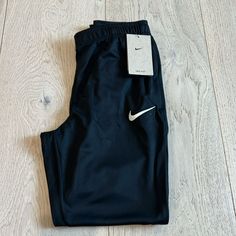 Nike Standard Fit Warmup Pants Brand New With Tags Women’s Size Small Dri-Fit Technology 100% Polyester Waist Measurement: 13.5” Inseam: 27” 10” High Rise Offers Welcome Bundle & Save 30% Discounted Shipping Nike Trousers With Side Pockets, Nike Bottoms With Elastic Waistband, Nike Tapered Leg Pants With Elastic Waistband, Nike Bottoms With Side Pockets, Nike Wide Leg Sports Bottoms, Nike Black Tapered Leg Pants, Nike Straight Leg Sports Bottoms, Nike Stretch Sportswear Pants, Nike Wide Leg Sportswear Bottoms