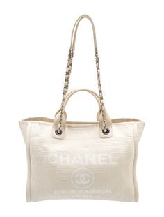 Chanel ToteBy Virginie ViardNeutrals CanvasInterlocking CC Logo & Chain-Link AccentSilver-Tone HardwareLeather & Raffia TrimRolled Handles & Chain-Link Shoulder StrapsCanvas Lining & Three Interior PocketsSnap Closure at TopIncludes Box, Dust Bag & Interior Zip Pouch Bag Interior, Diamond Drop Earrings, Cc Logo, Zip Pouch, Bag Handle, Chanel Shoes, Shopping Tote, Louboutin Shoes, Christian Louboutin Shoes