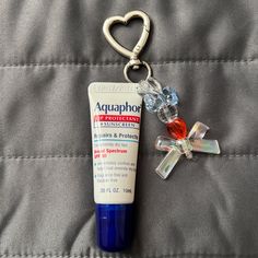 Brand New Aquaphor lip protectant and sunscreen .35 fl oz. Made into the perfect keychain for on the go application! Mini Aquaphor, Aquaphor Lip Balm, Lip Gloss Keychain, Aquaphor Lip, Lip Balm Keychain, Sees Candies, Ios Themes, Cool Keychains, Red Hair Inspo