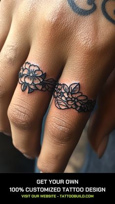 a woman's hand with tattoos on it and the words get your own custom tattoo design