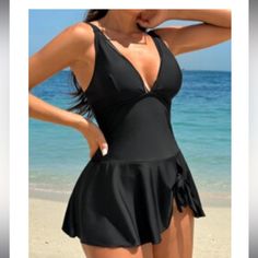 Nwt Black 2 Piece Bathing Suit. Top Is Skirted With Regular Bikini Bottom Underneath Black Lined V-neck Swimwear, Black V-neck Lined Swimwear, Lined Black Swim Skirt For The Beach, Lined Black Swim Skirt For Beach, Black V-neck Summer Tankini, Lined Black Swim Dress For Beachwear, Fitted Black Swim Skirt For Beach Season, Fitted Black Swim Dress For Beach, Black Fitted Swim Dress For Beach