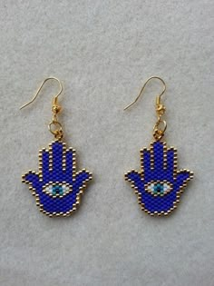 blue hamsa hand beaded earrings