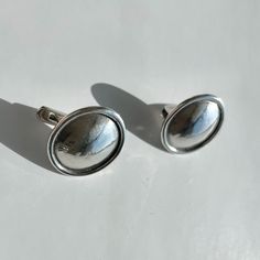 Absolutely gorgeous solid 925 silver circle mirror polished earrings. Hallmarked. Have nice weight to them (apr. 7 g together). Minimalist chic and elegance. Easy to put on, easy to wear.  Find a matching silver ring in my other listings: https://www.etsy.com/shop/stripeandbeat?section_id=52069996.   Great Xmas gift for a conscious fashion lover - unisex and ageless. Comes in a fabric drawstring bag. Ready for shipping immediately. Shipping cost includes Tracking Number. By buying and re-wearing Minimalistic Chic, Upcycled Accessories, Silversmithing Jewelry, Bold Statement Jewelry, Circle Mirror, Silver Circle, Minimalist Chic, Conscious Fashion, Wedding Jewelry Earrings