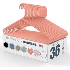 a pack of 50 heavy duty hangers in a box