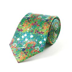 a green tie with colorful flowers on it