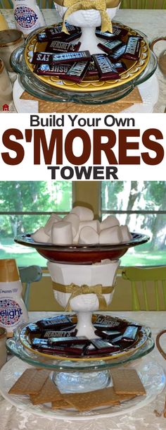 there is a cake stand with chocolates on it and the words build your own s'mores tower