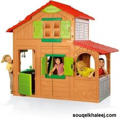 there is a toy house with people in it and two kids on the balcony looking at each other