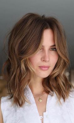 Popular 2023 Hairstyles, Med Length Hair With Layers And Curtain Bangs, Short Brown Hair With Caramel Highlights And Curtain Bangs, Brown Hair Short Layers, Medium Caramel Brown Hair, 70s Shag With Curtain Bangs, Effortless Short Hair, Brown Hair Cuts Medium Layers, Emma Watson Hair Color