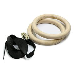 a pair of wooden rings with black straps