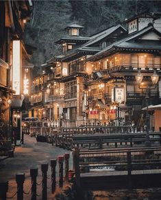 an image of a town at night with lights on