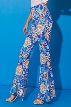 A printed woven flare pant with side zipper closure Indulge in the perfect blend of style and comfort with our LOVE MADE ME CRAZY WOVEN FLARE PANTS. With a sophisticated look and luxurious feel, they are crafted from quality woven fabric featuring a stylish print and side zipper closure for an effortless fit. Experience fashion-forward flair, oozing luxury and exclusivity. Matching set with LOVE MADE ME CRAZY WOVEN WOVEN TOP Details Self: 95% Cotton 5% Spandex Size & Fit - Model is 5`8" And Wear Trendy Flare Bottoms With Floral Print, Trendy Floral Print Flare Bottoms, Trendy Flared Bottoms With Floral Print, Retro Wide Leg Printed Bottoms, Trendy Wide Leg Printed Pants, Chic Flared Bottoms With Floral Print, Chic Flared Floral Print Bottoms, Chic Floral Print Flare Bottoms, Trendy Flare Pants With Floral Print