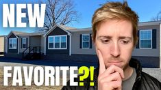 a man standing in front of a house with the words new favorite?