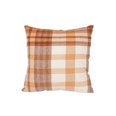 an orange and white plaid pillow on a white background