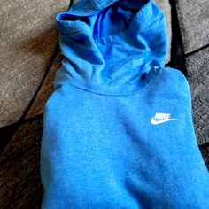 Brand New Without The Tags Nike Hoodie. Light Baby Blue Cozy Soft Material, Hooded Sweater With Turtle Neck Style Hood, And Classic Front Pocket Pouch. Womens Size Small Never Worn Before Or Washed. It's Brand New Blue Nike Hoodie For Loungewear, Nike Blue Hoodie For Loungewear, Blue Comfortable Fleece Tops, Cozy Blue Sweatshirt With Ribbed Cuffs, Comfortable Blue Cotton Sweatshirt, Cozy Blue Fleece Tops, Cozy Blue Fleece Top, Nike Fleece Top With Adjustable Hood, Comfortable Blue Hoodie With Ribbed Cuffs