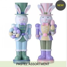 two colorful rabbit nutcrackers standing next to each other with the caption pastel assortment