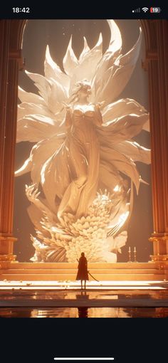 a woman standing in front of a giant white flower on top of a floor next to columns