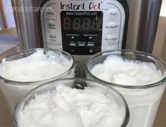 three bowls filled with whipped cream next to an instant pot