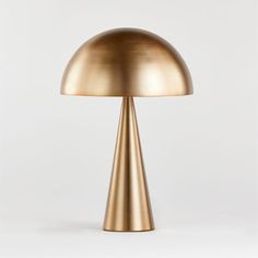 a gold lamp on a white background