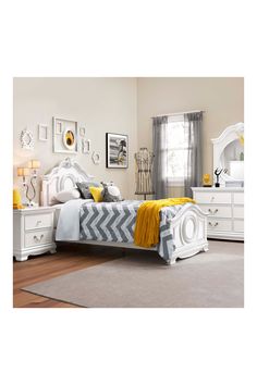 a bedroom with white furniture and yellow accents