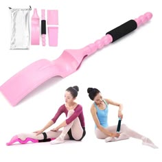 two women sitting on the ground with pink and black yoga equipment in front of them