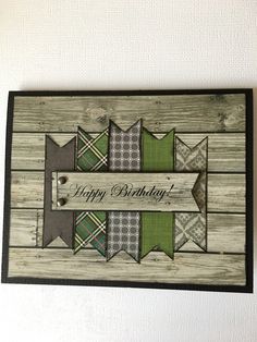 a happy birthday card with plaid fabric on the front and green ribbon around the edges