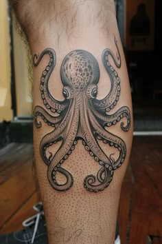 an octopus tattoo on the leg