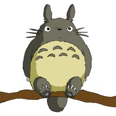 a totoro sitting on top of a branch