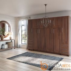 a room with wooden furniture and a large mirror on the wall next to a window