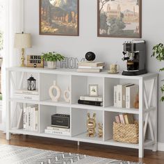 a shelf with books, coffee maker and other items on it in a living room