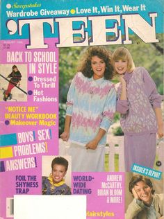 an old magazine cover with two women on the front and one is wearing a sweater