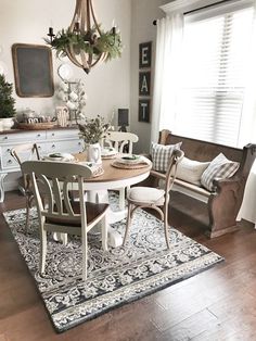 a living room filled with furniture and decor