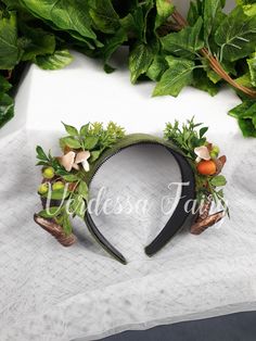 A magical mini ram horns forest headpiece resplendent with leaves and ferns in lush greens.  Ideal for an Earth Goddess, Forest fairy or wood sprite cosplay, jungle queen, a woodland wedding, photo shoots and special events. This smaller foliage headpiece, is a forest green, beautifully decorated with foliage and lots of little details, like hand made mushrooms. Featuring copper two toned mini horns, this magical piece creates a fabulous mythical presence and leaves you with a feeling of Earthy Forest Headpiece, Wood Sprite, Horns Headpiece, Forest Sprite, Jungle Queen, Leaf Headband, Acorn Leaf, Leaves Headband, Earth Goddess