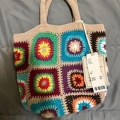 Never Worn Colorful Casual Crochet Bag For Vacation, Casual Colorful Square Bags, Casual Square Crochet Bag For Spring, Casual Multicolor Square Straw Bag, Casual Multicolor Crochet Bag For Everyday, Summer Granny Square Bags, Square Brown Crochet Bag For Spring, Casual Multicolor Rectangular Straw Bag, Casual Crochet Bag With Granny Square For Summer