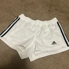 Nwot Adidas Shorts. Comfy. Athletic. Perfect Condition. Size Xs White Adidas Sports Shorts, Adidas Sporty White Athletic Shorts, White Three Stripes Athletic Shorts For Sports, White Athletic Shorts With Three Stripes For Summer, White Three Stripes Athletic Shorts, Sporty White Shorts, White Three-stripe Sports Shorts, White Stretch Shorts With Three Stripes, White Stretch Bottoms With Three Stripes