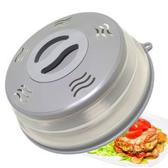 an image of a food warmer on a plate next to it's lid and cover