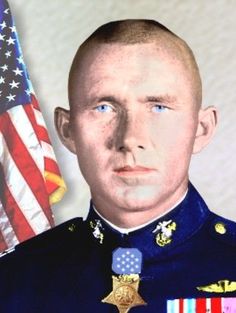 a man in uniform with an american flag and medal around his neck is looking at the camera