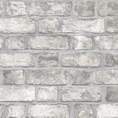 a gray brick wall with no mortars