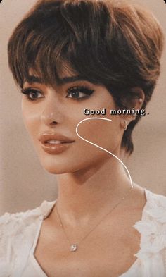 an image of a woman with short hair and the words good morning on her face