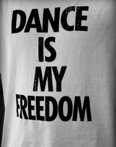 a t - shirt with the words dance is my freedom printed on it in black and white