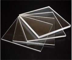 clear acrylic sheets on black background