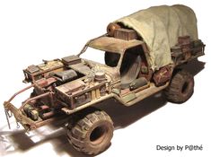 an old toy truck is covered with a blanket