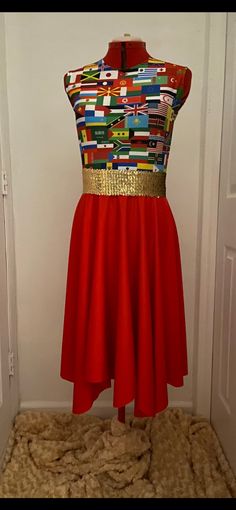 Beautiful overlay, the upper part of the dress is made with the Nations Flag design, it's sleeveless, scoop neck, no back zipper, and red skirt. Belt is included. Flags Design, Red Skirt, Skirt Belt, Red Skirts, Flag Design, Dress Clothes For Women, The Dress, Scoop Neck, Dress Outfits