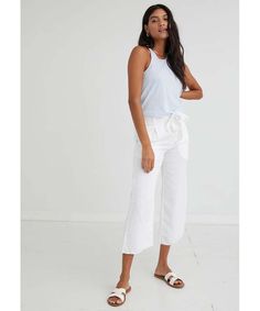 A chic update on culottes, this pair features a waist tie and wide legs for easy wear and added style. 50% Cotton, 25% Tencel, 25% Linen. Made in Los Angeles 50% Cotton, 25% Tencel, 25% Linen Machine wash cold Front button closure Side seam pockets Detachable belt Model is 5'10" and wearing a size small Waist: 28" Waist to hem: 35" Inseam: 24" Cold Front, Bella Dahl, Wide Legs, Small Waist, Large White, Easy Wear, Waist Tie, Wide Leg, Angeles