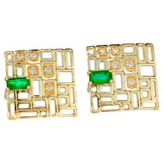 14 karat gold earrings studs with genuine emeralds and diamonds. May birthstone. Metal: 14 karat gold Weight: 2.2 g. Size: 12.20 x 12 mm. Central stone: 2 genuine emeralds: weight - 0.15 ct + 0.15 ct = total 0.30 ct, both has a rich green color. Baguette cut, clarity with inclusions, size - 4.5 x 2.5 mm each stone. Surrouding stones: Diamonds: 10 pieces, weight - 10 x 0.01 ct = 0.10 ct total in both earrings. Round brilliant cut, G/VS2-SI1. Earrings goes with a plastics clasps. Emerald Studs, Baguette Studs, Emerald Diamond Earrings, Emerald Earrings Studs, Bracelet Love, Solid Gold Earrings, Gio Ponti, Earrings Studs, Stone Studs