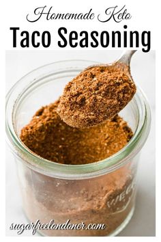 homemade taco seasoning in a glass jar with a spoon