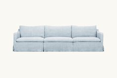 a light blue couch on a white background with no one in it's room