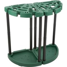 two green plastic tables with black legs and one has holes in the middle for storage