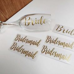 the bride and groom name tags are shown in gold foil