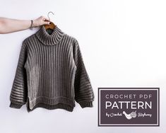 a sweater hanging on a clothes hanger with the text crochet pattern written below it